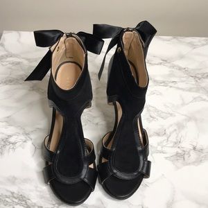 Black Sandals with back zipper and bow detail